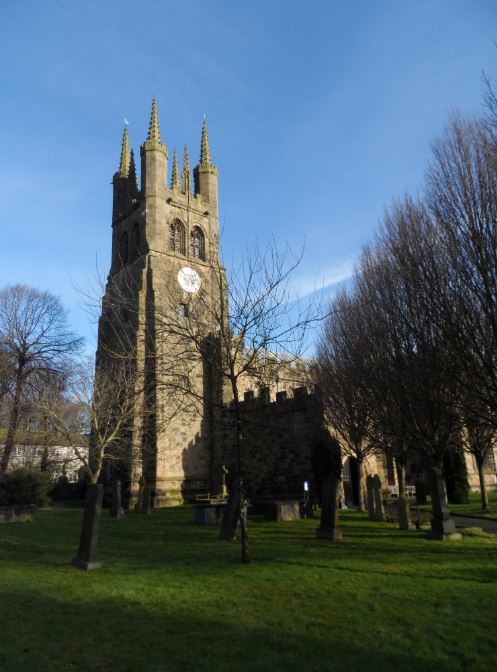 The south side and battlemented exterior of St John the Baptist Church